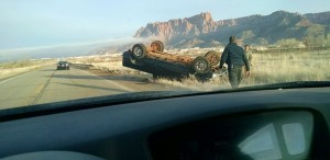 A truck rests on its top after hitting ice on a bridge and flipping, Colorado City, Arizona, Dec. 19,. 2014 | Photo courtesy of Debi Groves, St. George News