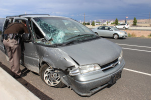 Utah Highway Patrol Sgt. Danny Ferguson had his second close call in the last year when a minivan crashed into a truck just feet from where he stood, St. George, Utah, July 31, 2015 | Photo by Nataly Burdick, St. George News