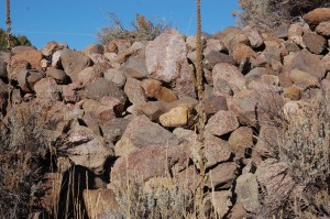 A rock pile located in a ravine near Mountain Meadows which California archaeologist, Everett Bassett claims is a mass grave site containing the remains of the Mountain Meadows Massacre victims, Mountain Meadows, Nov. 7, 2015 | Photo by Hollie Reina, St. George News