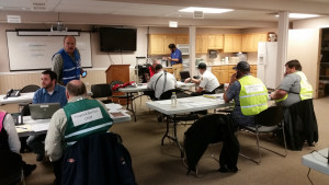 Section chiefs work together to address exercise issues that will translate into actual event problems and solutions, Emergency Center Operations, Cedar City, Utah, March 17, 2016 | Photo Courtesy of Iron County Emergency Management, St. George News
