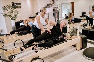 Sheridan St. Claire trains a client at Symmetry Pilates, St. George, Utah, date unspecified | Photo courtesy of Sheridan St. Claire, St. George News