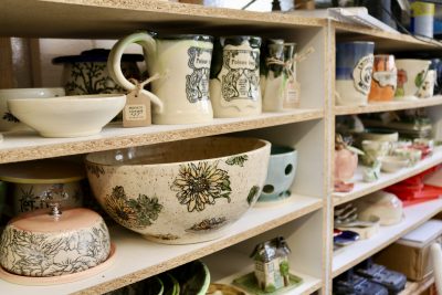 A variety of ceramic art by Gerri Abdollah sits on a shelf inside her she-shed, St. George, Utah, June 29, 2022 | Photo by Jessi Bang, St. George News