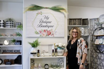 Rachel Elison stands inside her store surrounded by her boutique items, St. George, Utah, Aug. 30, 2022 | Photo by Jessi Bang, St. George News