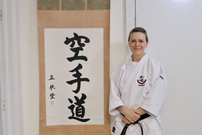 Shannon Modry stands for a photo inside Southern Utah Wado-Kai Karate, St. George, Utah, Aug. 30, 2022 | Photo by Jessi Bang, St. George News