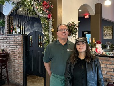 Richard Doerr and Marie Perez, co-owners of Bella Marie's Pizzeria, pose inside their restaurant, St. George, Utah, Dec. 14, 2022 | Photo by Jessi Bang, St. George News
