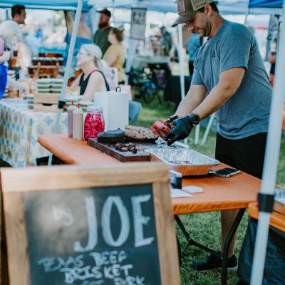 Joe Solomon is seen working his barbeque booth at the St. George Downtown farmers market in Utah, date unspecified | Photo courtesy of Joe Solomon, St. George News