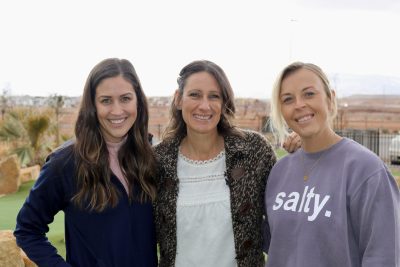 (Left to right) Susannah O'Brien, local marketing manager for BigShots Golf, Event Producer Melynda Fanene with GTHR1 Productions and Emilee Potter, the owner of Salty. Clothing Co. pose together for a photo in St. George, Utah, Feb. 14, 2023 | Photo by Jessi Bang, St. George News