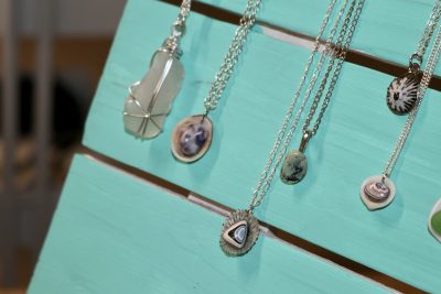 Necklace pendants by Rock Wave Jewelry feature Hawaiian sea glass, sea shells and Utah rocks, St. George, Utah, Feb. 27, 2023 | Photo by Jessi Bang, St. George News