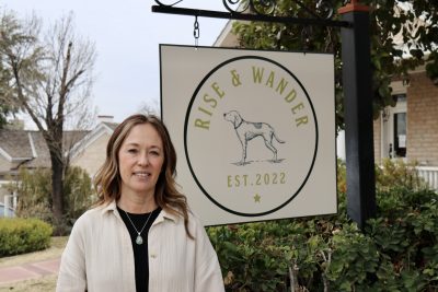 Rise & Wander owner Monica Bracken smiles for the camera outside her shop in St. George, Utah on March 8, 2023 | Photo by Jessi Bang, St. George News