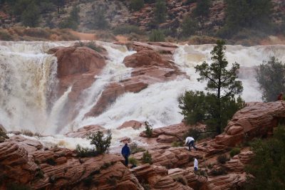 Waterfalls flow down the red rocks at Gunlock State Park in Gunlock, Utah, March 15, 2023 | Photo by Jessi Bang, St. George News