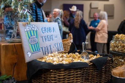 Attendees enjoy the pre-party at the Coyote Tales Storytelling event that unveiled a repurposed gumball machine with student crafts, Ivins, Utah, March 24, 2023 | Photo by Alan Holben Photography courtesy of Victoria Topham, St. George News