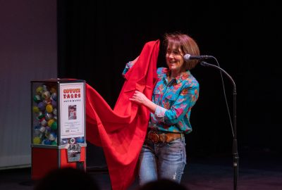 Victoria Topham, the founder of Coyote Tales Storytelling, unveils a gumball machine filled with elementary student's crafts, Ivins, Utah, March 24, 2023 | Photo by Alan Holben Photography courtesy of Victoria Topham, St. George News