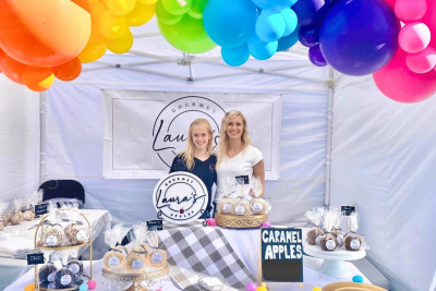 Laura Clark and her daughter Katelyn sell their caramel apples at a local market, location and date unspecified | Photo courtesy of Laura Clark, St. George News