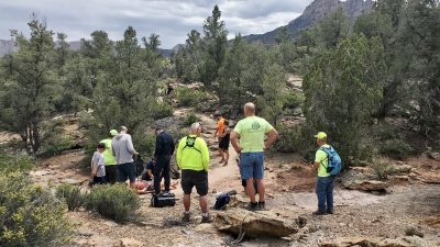 First responders assist a biker who fell on Wire Mesa Trail near Springdale, Utah, May 13, 2023 | Photo via Washington County Sheriff's Office Facebook page, St. George News