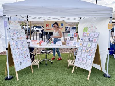 Alex Peterson works her Pete & Pen booth at a local market in St. George, Utah, May 2023 | Photo courtesy of Alex Peterson, St. George News