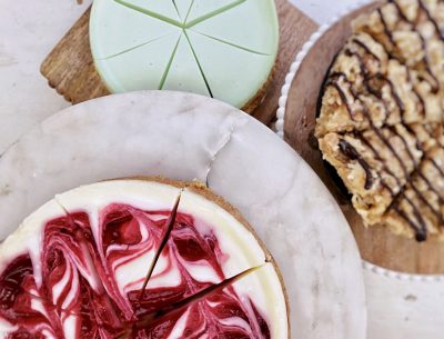 A variety of Se' Cheese Gourmet Cheesecakes sit on a counter, location and date unspecified | Photo courtesy of Candice Fowler, St. George News