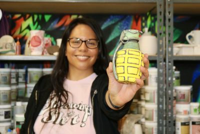 Sun Lotus Designs owner Marjorie Ann Eno shows off her pottery at the Tilted Kiln in St. George, Utah, Aug. 2, 2023 | Photo by Jessi Bang, St. George News