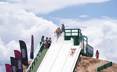 The site of the Yin on fire features a man-made lake and a 200-foot water slide, Cedar City, Utah, date unspecified | Photo courtesy of threeeaksasis.com, St. George News