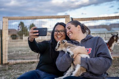 Attendees take a selfie with a baby goat during Goat Yoga at Inner Peas Farm in Hurricane, Utah, date unspecified | Photo courtesy of Camille Zolman, St. George News