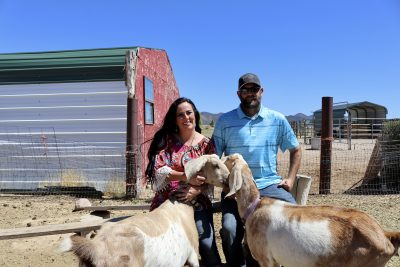 Randilyn Waegerle and her husband Shane Waegerle enjoy time with goats on their farm in Enterprise, Utah, Aug. 30, 2023 | Photo by Jessi Bang, St. George News