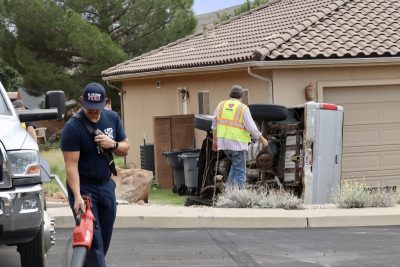 A truck is seen on its side after it crashes into a home in St. George, Utah, Sep. 10, 2023 | Photo by Jessi Bang, St. George News