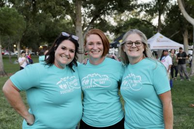 (L-R) Drug Court Manager Mandee Krajnc, USARA Peer Recovery coach Crystal Randall and USARA Program Manager Marcie Gray smile for the camera during the Southwest Utah Recovery Day celebration in St. George, Utah, Sept. 21, 2023 | Photo by Jessi Bang, St. George News