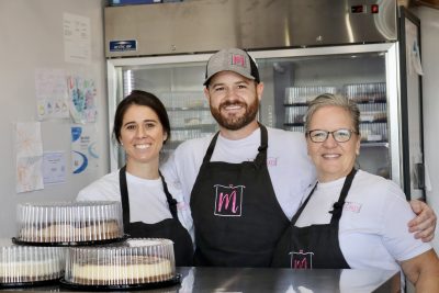 (L-R) Hannah Reed, Trevor Reed and Mary Reed stand inside Mary's Cheesecakes in St. George, Utah, Oct. 9, 2023 | Photo by Jessi Bang, St. George News