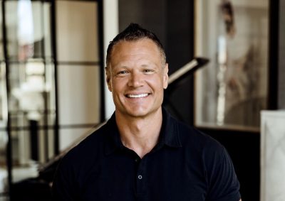 Justin Prince smiles for the camera inside his home in St. George, Utah, date unspecified | Photo courtesy of Elizabeth Cole, St. George News