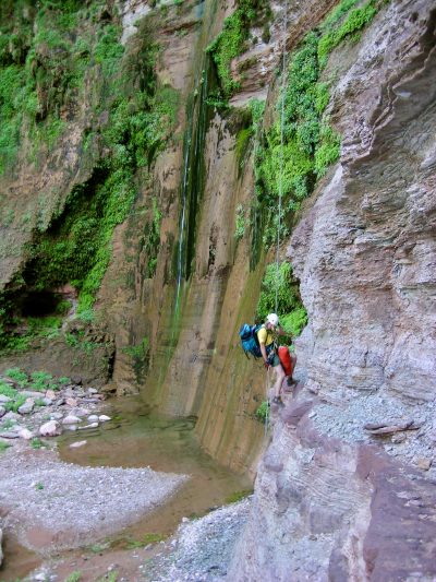 Bo Beck repels down a mountain next to a waterfall in Zion National Park, Utah, date not specified | Photo by Bo Beck, St. George News