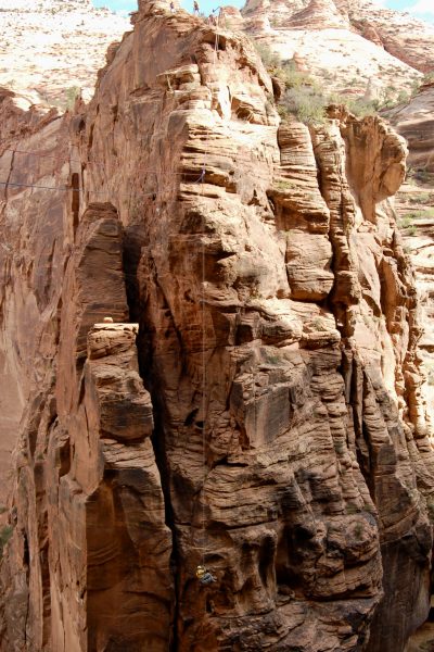 Bo Beck repels down a towering sandstone mountain, location and date not specified | Photo courtesy of Bo Beck, St. George News