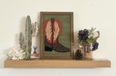 Artwork by Rachel Mangan includes a framed cowboy boot made out of old climbing rope, location and date unspecified | Photo courtesy of Rachel Mangan, St. George News