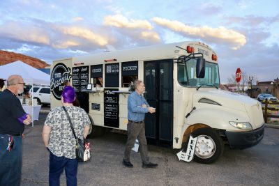 Attendees of the Wednesday Night Market order fresh biscuits from The Biscuit Bus, St. George, Utah, March 6, 2024 | Photo by Jessi Bang, St. George News