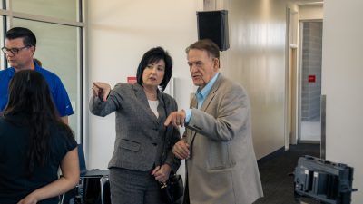 St. George Mayor Michele Randall speaks with Canyon Media owner Kent Frandsen at the 4th of July Celebration press conference in St. George, Utah, April 24, 2024 | Photo courtesy of Aaron Crane, St. George News