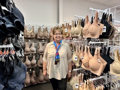 Lace by Louise owner Louise Stucki smiles for the camera inside her first Southern Utah store in St. George, Utah, April 22, 2024 | Photo by Jessi Bang, St. George News