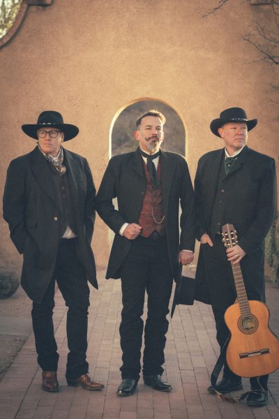 Tim Gates, Matt Lopez and Brad Hull make up the band Due West, Tucson, Arizona, circa 2023 | Photo courtesy of Russ Dixon, St. George News