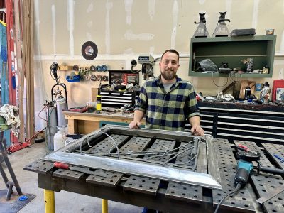 Jordan Mansen works on a custom fireplace screen, St. George, Utah, May 2, 2024 | Photo by Jessi Bang, St. George News