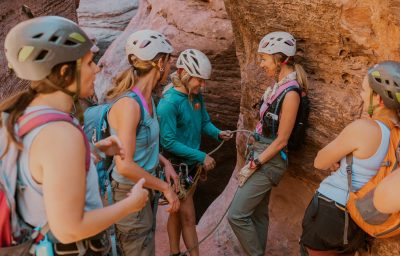 Gabby Olsen with Rock Odysseys leads a women's retreat group on an outdoor rock climb, location and date not specified | Photo courtesy of Gabby Olsen, St. George News