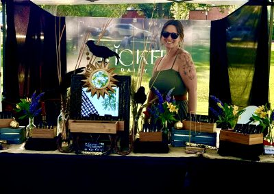 Daisy Hobbs runs her booth at a local market, location and date not specified | Photo courtesy of Daisy Hobbs, St. George News