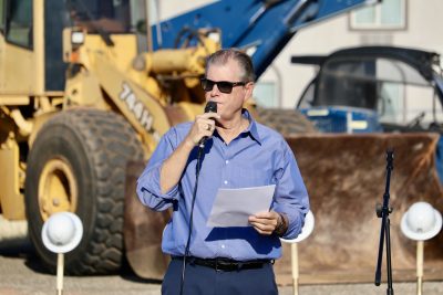 St. George Musical Theater President Bruce Bennett speaks at the groundbreaking ceremony for the new performing arts theater that will soon be built, St. George, Utah, July 18, 2024 | Photo by Jessi Bang, St. George News